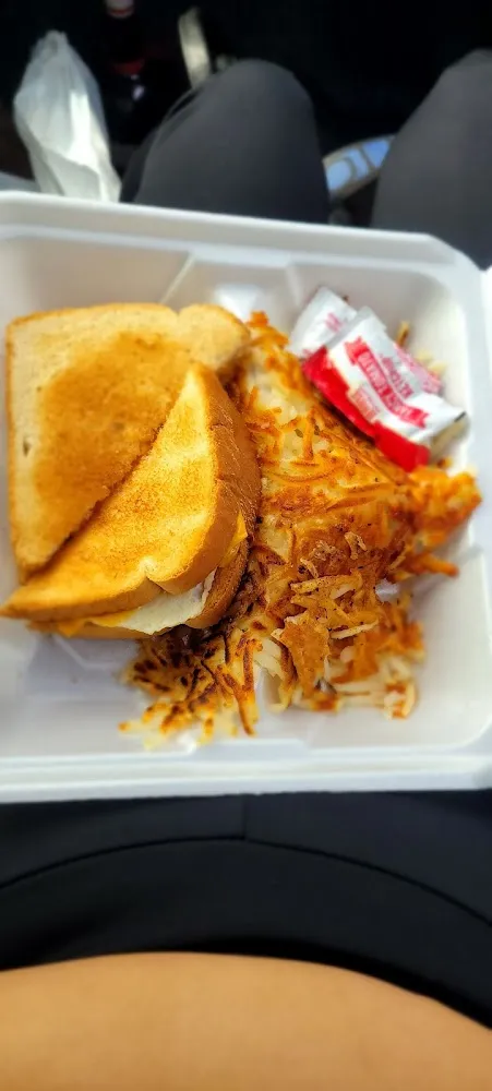 Egg Sandwich with Cheese and Hash Browns